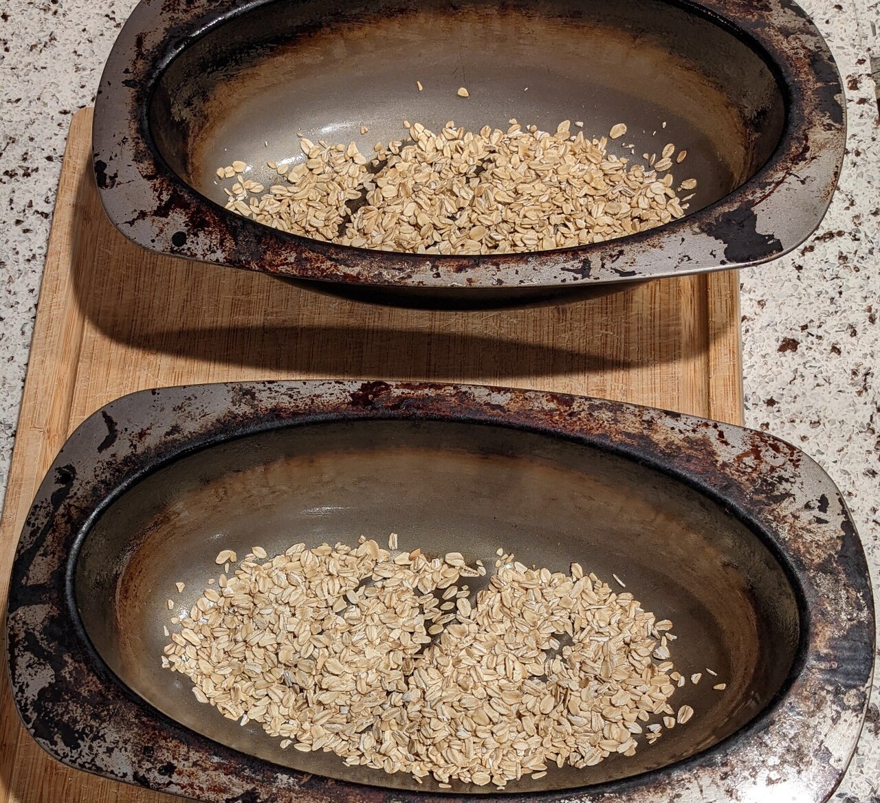 Add oats to prevent the bread from sticking in the mould