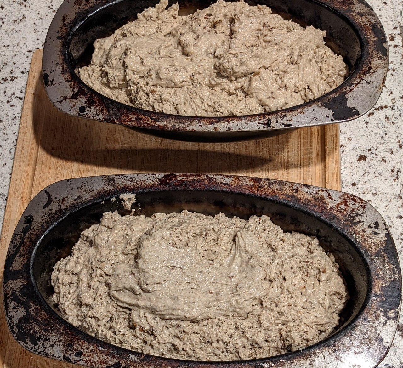 Carefully transfer the dough to the moulds